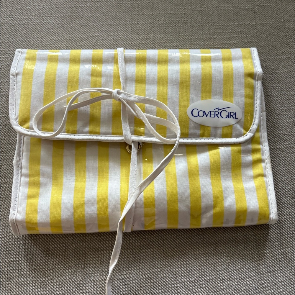 Vintage 1980s Covergirl Hanging Makeup Organizer. White and yellow stripe